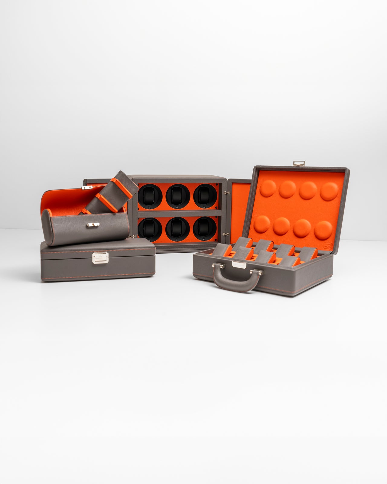 Slate grey and orange watch boxes and watch winders
